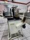 Labeling machine for cylindrical bottles