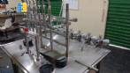 Linear filling machine with 6 pistons filling system