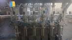 Linear filling machine with 6 pistons filling system