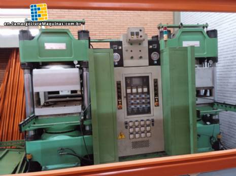 Double vacuum hydraulic press for pan stone rubber vulcanization