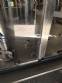 Zegla rotary filling machine with rinser and three-block capping system.