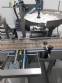 Filling line with capsule counter and screw machine