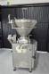Handtmann vacuum stuffer with twister and tilting elevator, up to 6,000 kg per hour.