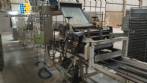Continuous line laminator, cutter and folder for long dry pasta (tagliatelle).