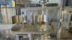Stainless steel filling machine for beer liquids in Brabeer bottles