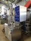 Stainless steel filling machine for beer liquids in Brabeer bottles