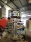 Stainless steel filling machine for beer liquids in Brabeer bottles