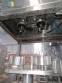 Stainless steel filling machine for beer liquids in Brabeer bottles