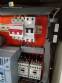 Automatic labeling machine for flat products
