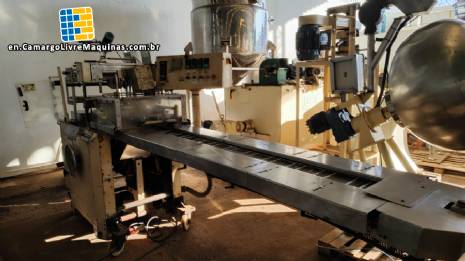 Otto Haensel V3 automatic cellophane wrapping machine for packaging boxes of teas, chocolates, perfumes, biscuits, creams, candies, sweets. Otto Haensel V3 automatic cellophane wrapping machine for packaging boxes of teas, chocolates, perfumes, biscuits, creams, candies, sweets.